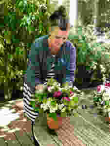 Francesca adds statement flowers to a bouquet