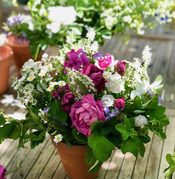 Finish with delicate seasonal blooms says Francesca Sharp Flowers