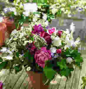 Finish with delicate seasonal blooms says Francesca Sharp Flowers