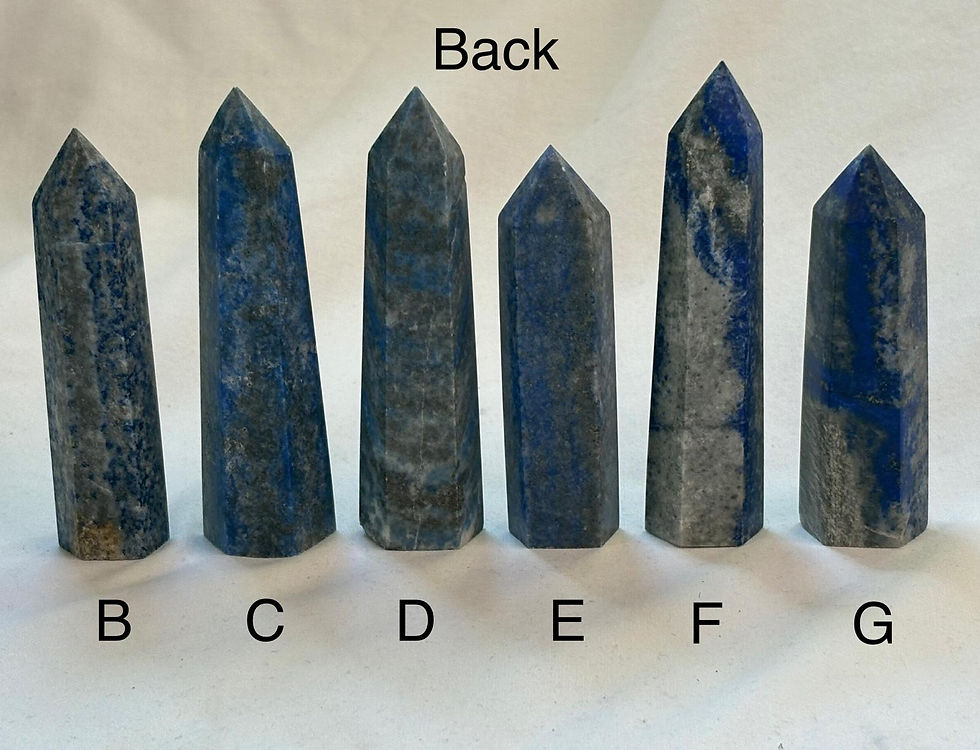 Six blue stone towers labeled Back, C, D, E, and F, sparkle in stone.