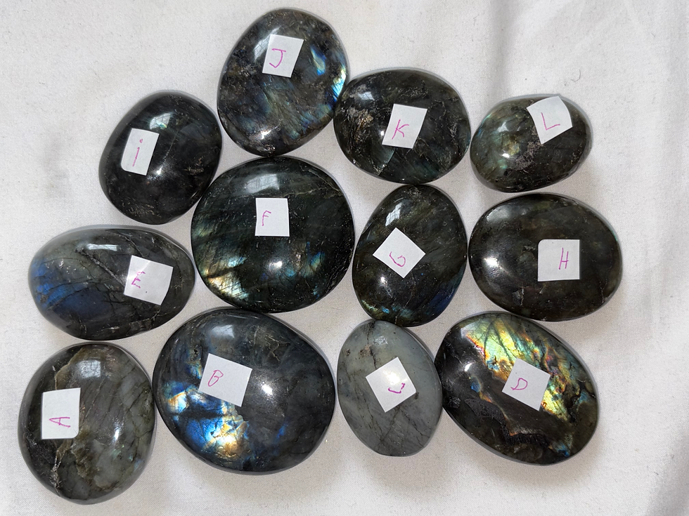 Various stones labeled with letters, showing blue and gold Sparkle In Stone