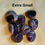 Thumbnail: Extra Small text above several purple stones with natural sparkle in stone.