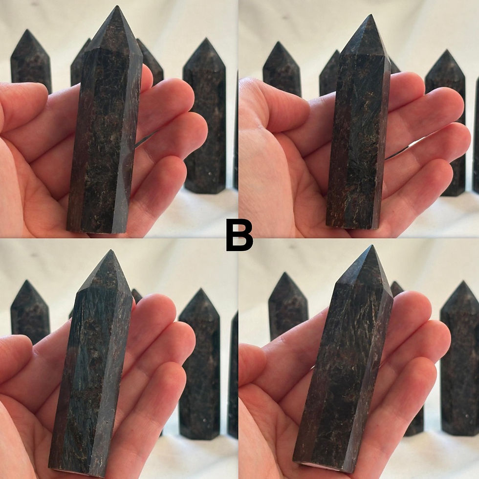 Thumbnail: Hand holding a black crystal tower, other towers in the background. Sparkle In Stone