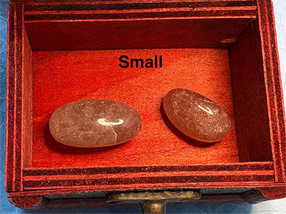 Two stones inside a box, visible text Small. Sparkle In Stone