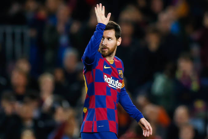 Leonel Messi playing for FC Barcelona at Camp Nou