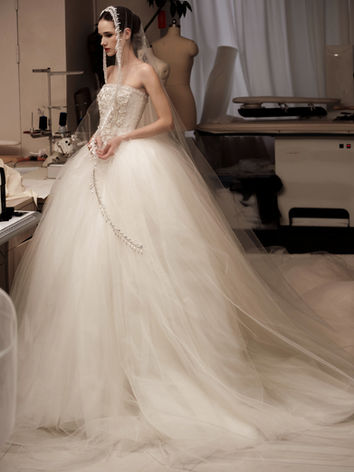 Embellished tulle bridal gown and veil by Cheyenne Tsai from the Serendipity of Bloom wedding collection