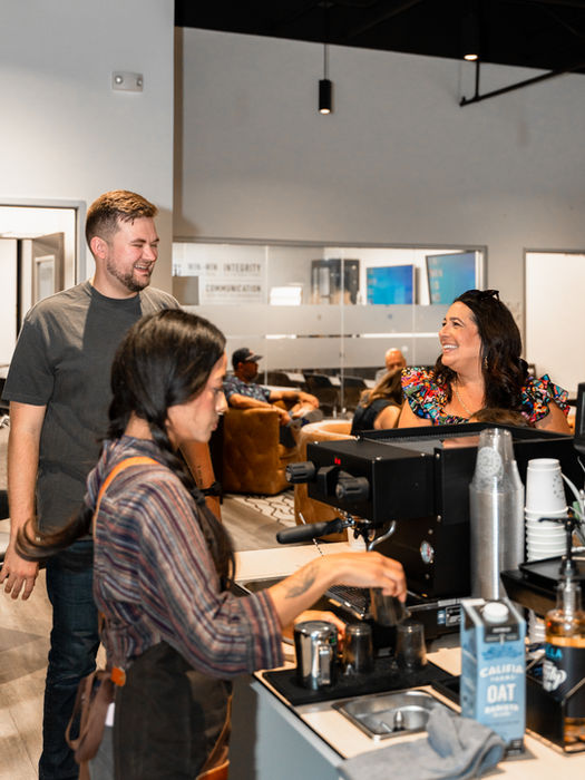 Reunion Coffee Cart barista serving guests delicious coffee at an event