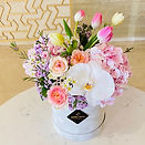 pink tulip pink hydrangea arrangement with phalaenopsis combination in flower box