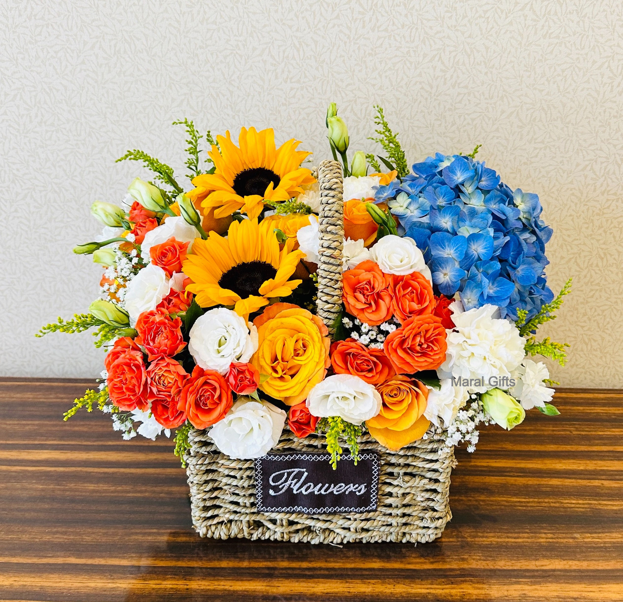 Sunflower and hydrangea in a basket