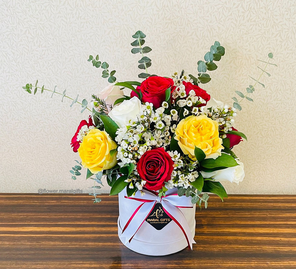 Charm and Sweet flower box 21 mix color fuchsia roses red roses white and yellow with White wax flower and Eucalyptus