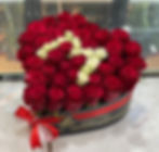 Write alphabet name of love in flower box Dubai