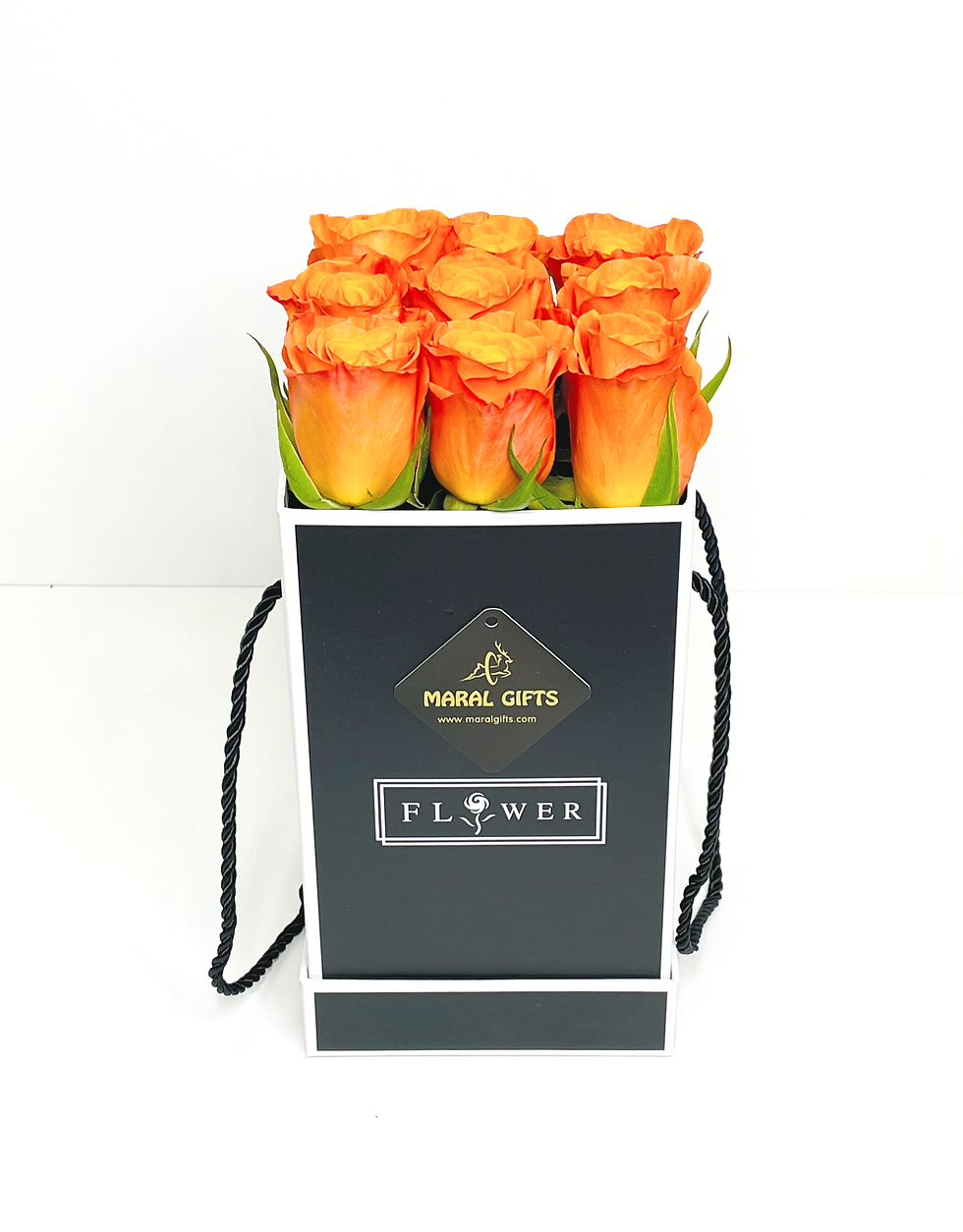 Roses orange color confidential in a black square boz
