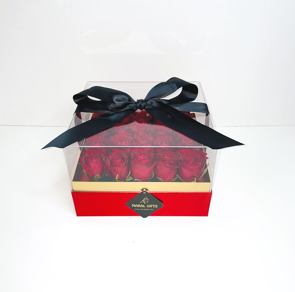 Flower arrangement in a acrylic box Delivery Free Dubai