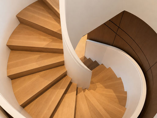 Sculpting the Stair: A Curved Corian Staircase for a Private New York Residence