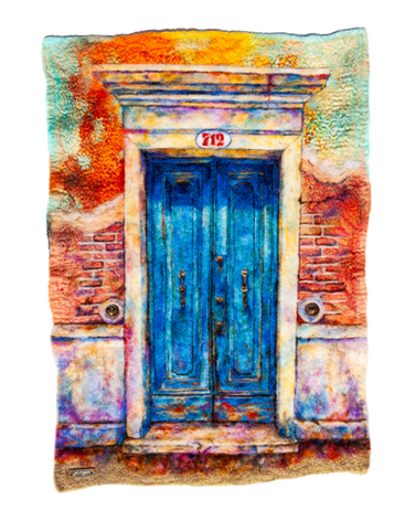 Contemporary fiber artwork depicting a weathered blue double door set within an aged Venetian brick and stucco façade. Create
