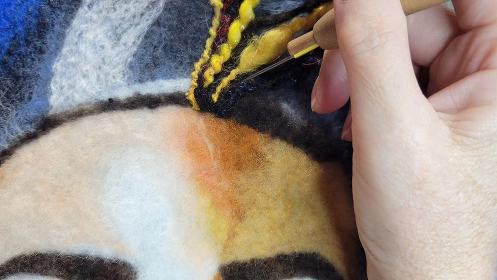 “Dream Girl,” felted portrait inspired by musician Samantha Fish with sculptural blonde yarn hair and lightning-bolt guitar strap.