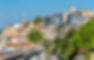 Panoramic view of historic buildings in a French village.