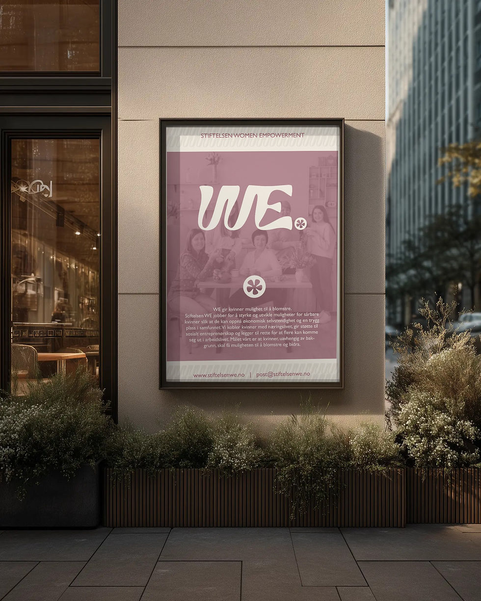 Plakat med WE logo på bygning