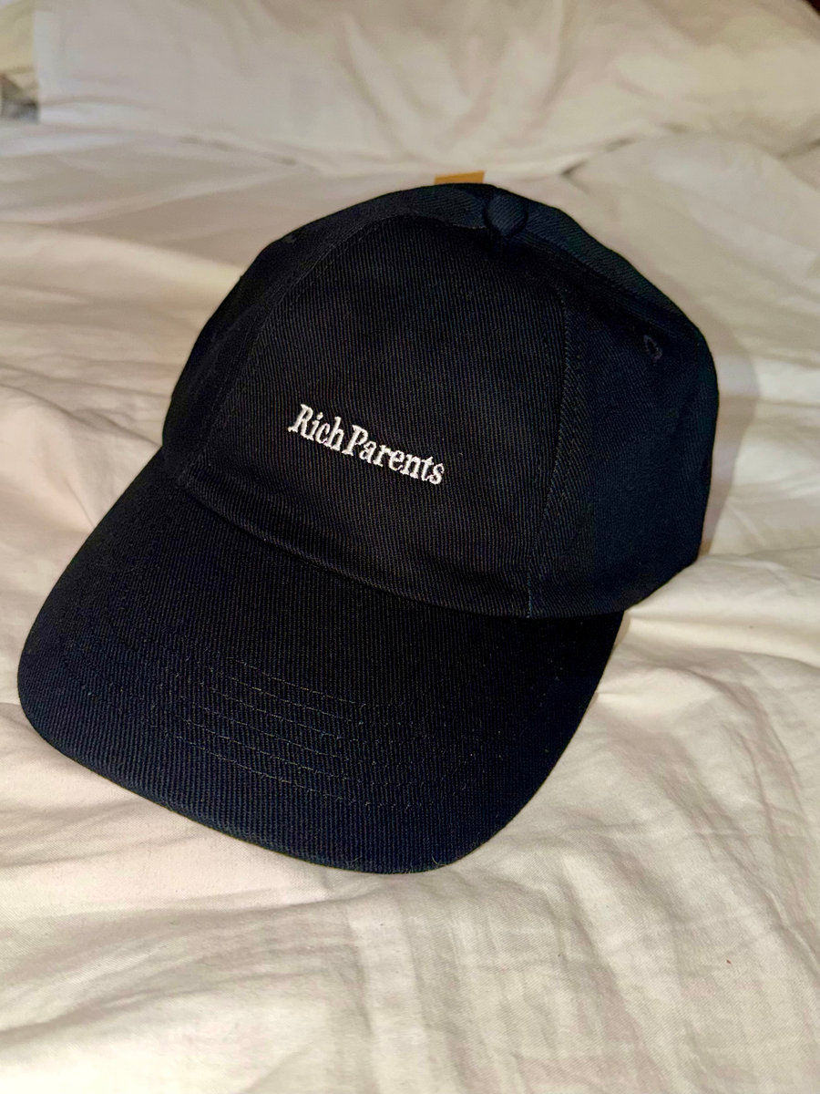 Rich Parents Manifestation Hat in black with stitched logo