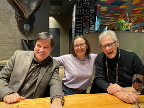 Andre M. M. Sousa, Paola Artlotta and Larry Swanson at the restaurant Jaleo in Washington, DC.
