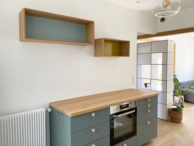Rénovation d'une cuisine vert d'eau en région parisienne par un architecte d'intérieur