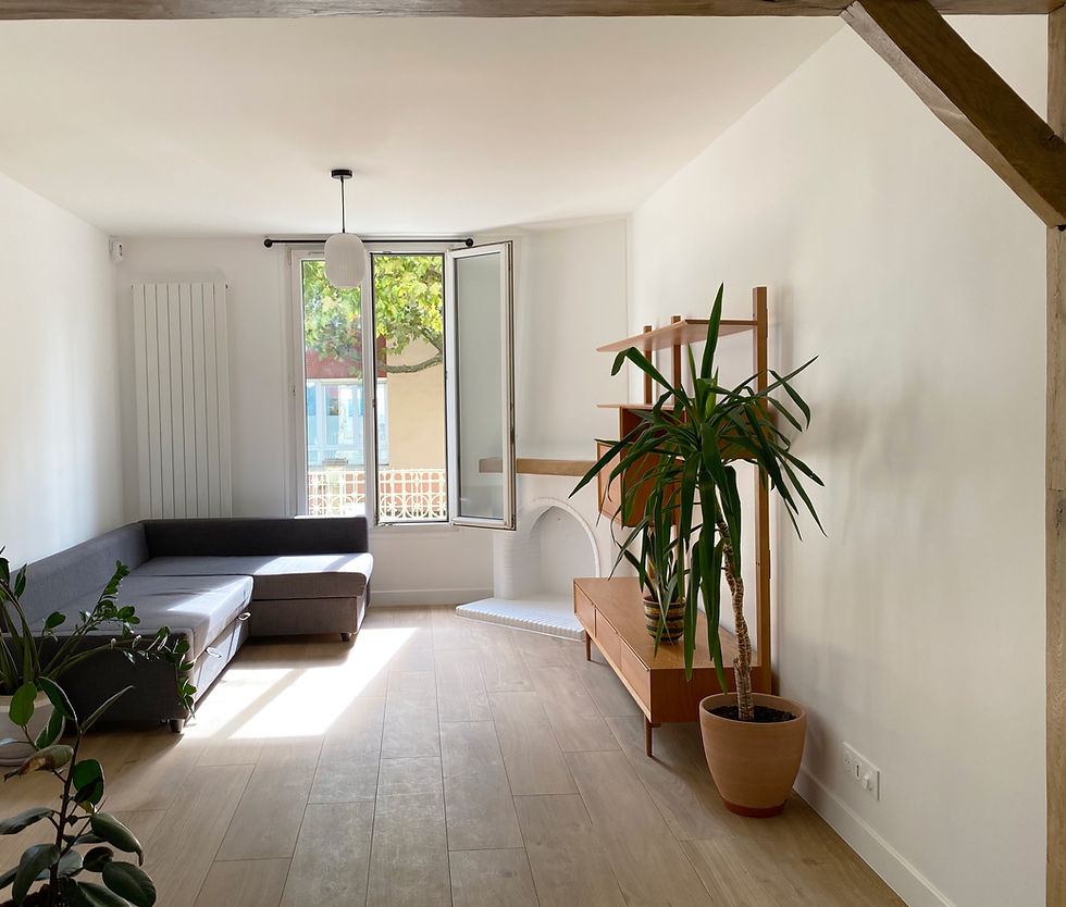 Salon de la maison après rénovation par un architecte d'intérieur