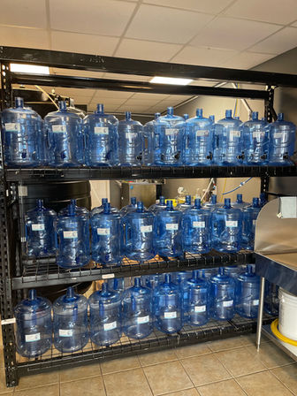 WaterBoy Pasadena shelf containing 5 gallon containers