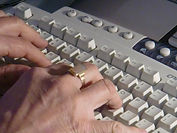 Hands on a keyboard by Sheri McGuinn