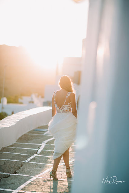 Bride walking on streets Of corfu