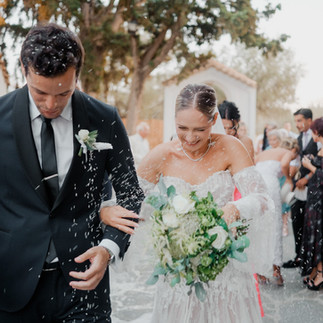 Bride and groom walking after wedding ceremony in Athens