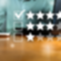 a row of three star blocks, with the top one being ticked for 4 stars, the next row is 3 star highlighted and bottom 1 star. Computer in background