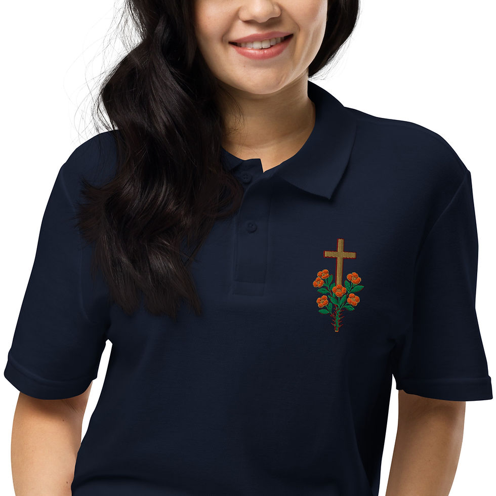 Thumbnail: Woman wearing cross and flower embroidered navy polo shirt. 3FoldLoveCo.