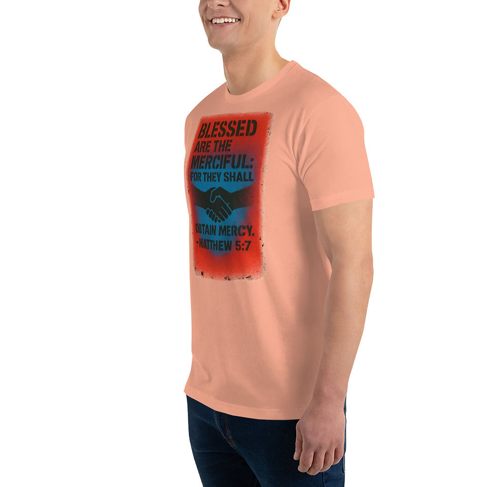 Thumbnail: Man wearing a peach t-shirt with text 