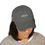 Thumbnail: Woman wearing gray Doxa Apparel baseball cap