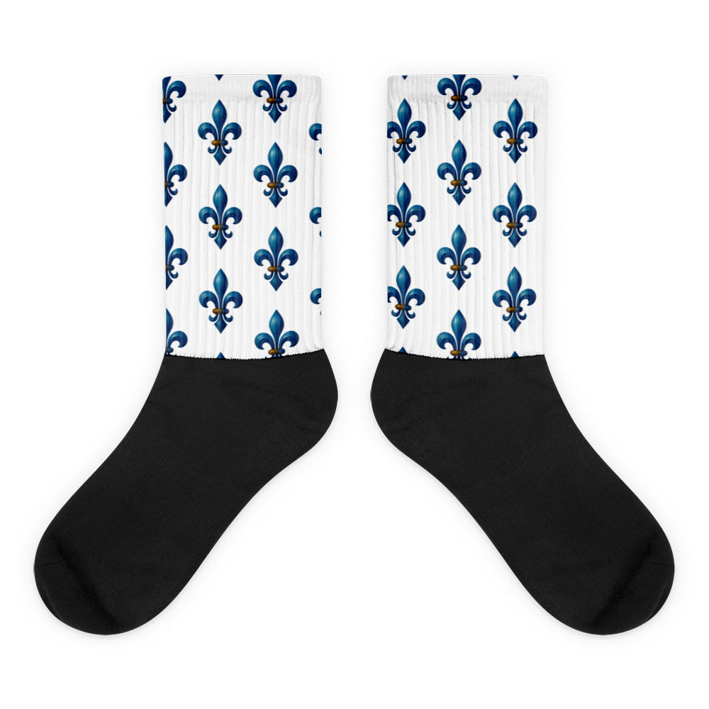 Pair of black and white socks with blue fleur-de-lis pattern design.