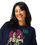 Thumbnail: Smiling woman wearing crew neck sweatshirt with graphic design 3FoldLoveCo.