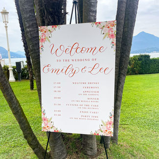 Wedding welcome sign with watercolour florals and handwritten calligraphy