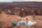 An eloping couple enjoys a picnic while looking out over Dead Horse Point State Park.