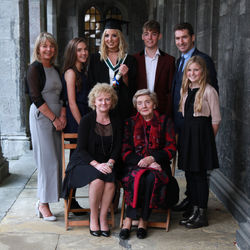 Graduation portrait family.