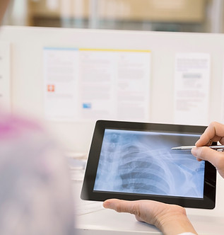 Doctor Reviewing X-Ray