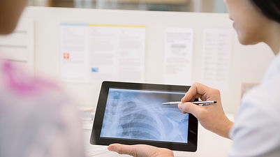 Doctor Reviewing Chest X-Ray