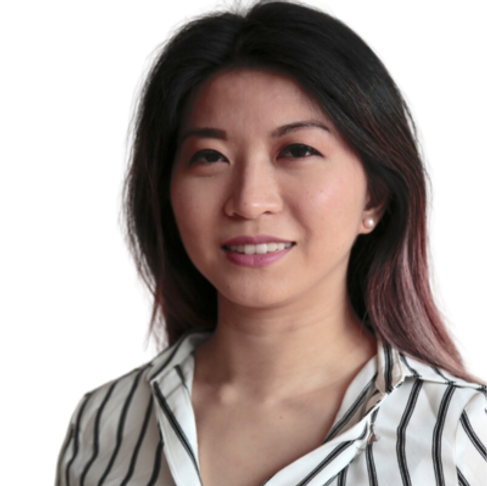 A woman with long black hair and a striped shirt smiling in front of a peach-colored background.