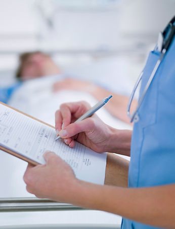 Nurse Taking Patient Notes