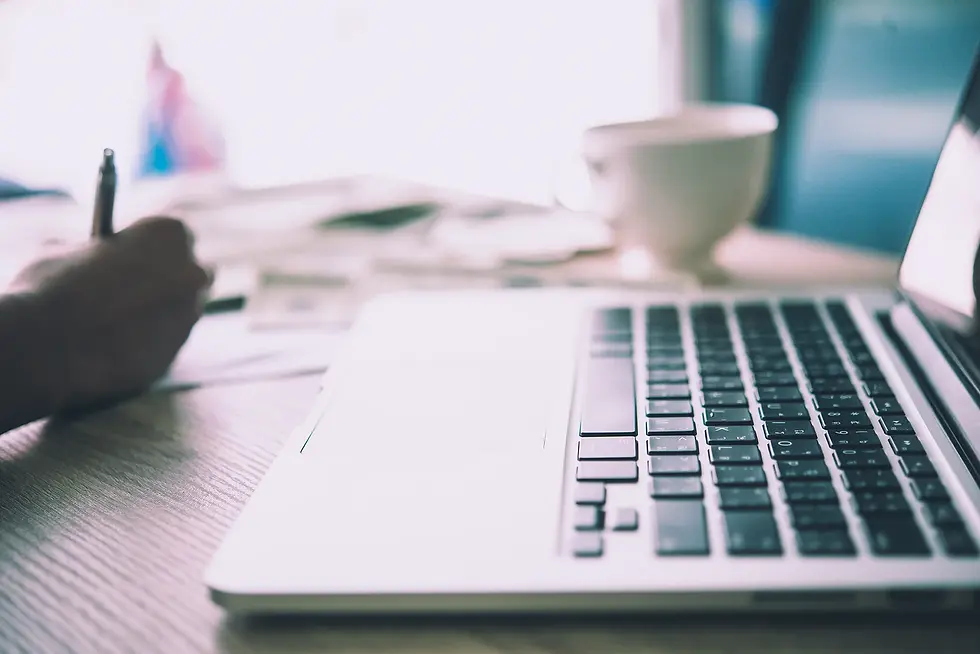 UGC image of a desk with a laptop in the morning