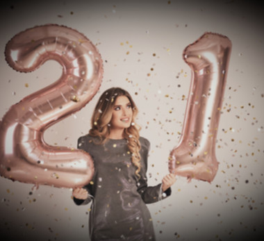 happy-young-woman-with-balloons-celebrat