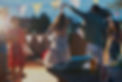 a rooftop party, a couple is dancing
