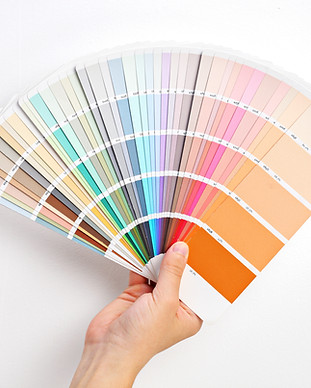 Hand Holding Color Swatches