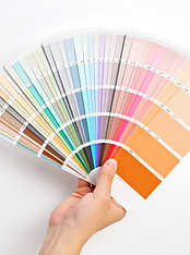Hand Holding Color Swatches