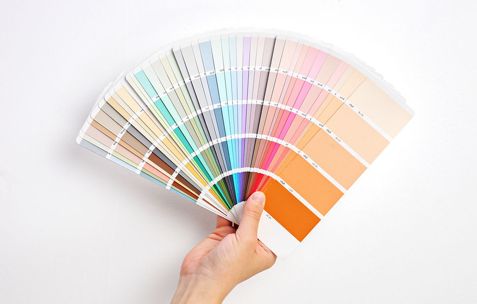 Hand Holding Color Swatches