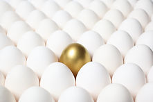 Golden-Egg-Standing-Out-from-a-Crowd-of-